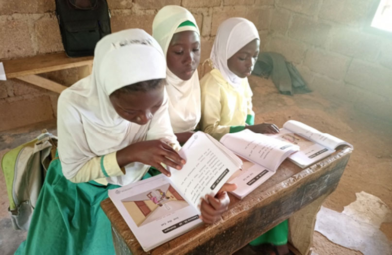 students with textbooks